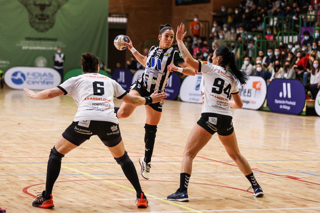 Malaga close in on final after big home win 