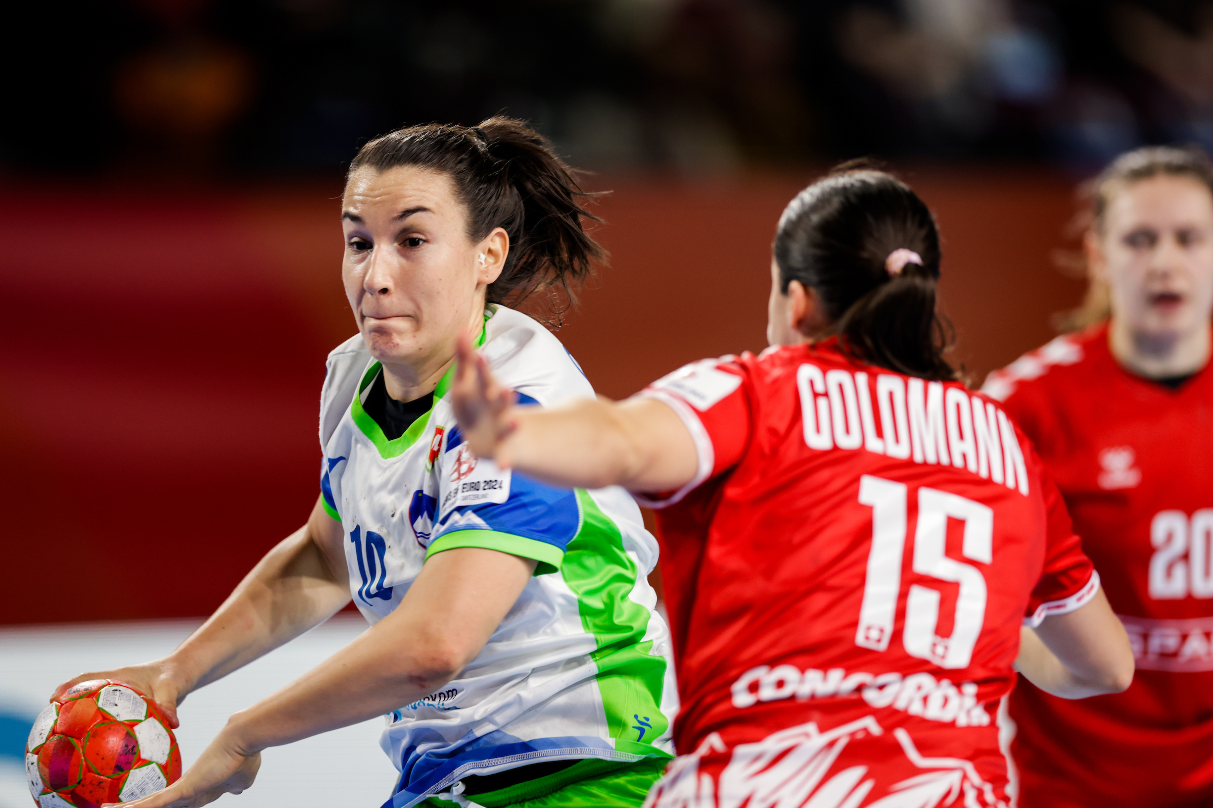 Slovenia take first main round points